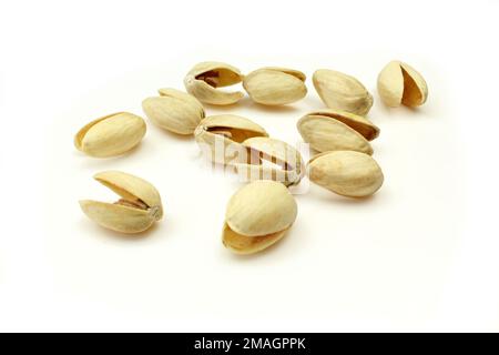 Empty pistachio shells isolated on white background Stock Photo