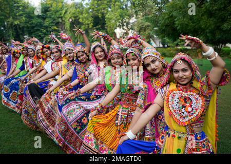 Reuters Pictures - Participants pose for pictures during rehearsals for the  Garba folk dance for the upcoming Navratri, a festival during which  devotees worship the Hindu goddess Durga in Ahmedabad, India. More