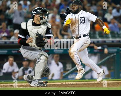Detroit Tigers' Akil Baddoo (60) steals second base under the glove of  Chicago White Sox shortstop Tim Anderson (7) during the fourth inning of a  baseball game , Friday, Oct. 1, 2021