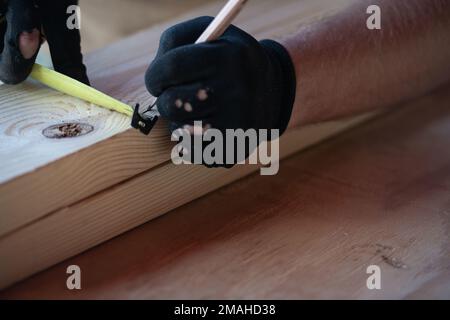 (220526-N-OI810-0790) KEY WEST, Florida (May 26, 2022) Builder 1st Class Steven Arkin, from Long Beach, Mississippi, assigned to Naval Mobile Construction Battalion (NMCB) 14, rebuilds a table at Boca Chica Air Field small arms range, Naval Air Station Key West (NASKW), May 26, 2016. Seabees assigned to NMCB-14 travelled to NASKW to perform on-site training and assist with facility and compound maintenance. NMCB-14 provides advance base construction, battle damage repair, contingency engineering, humanitarian assistance and disaster recovery support to our fleet and unified commanders. Stock Photo