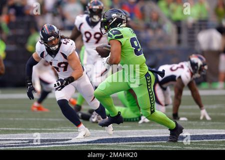 Denver Broncos linebacker Alex Singleton (49) looks into the backfield  during an NFL football game against the San Francisco 49ers, Saturday, Aug  19, 2023, in Santa Clara, Calif. (AP Photo/Scot Tucker Stock