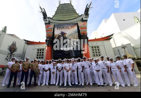 Hollywood, Calif. (May 27, 2022) – Sailors, assigned to amphibious assault ship USS Essex (LHD 2) and the San Antonio-class amphibious transport dock ship USS Portland (LPD 27), and U.S. Marines, assigned to the 15th Marine Expeditionary Unit, pose for a photo at the TCL Chinese Theatre during the premiere of Top Gun: Maverick as part of Los Angeles Fleet Week (LAFW) May 27, 2022. LAFW is an opportunity for the American public to meet their Navy, Marine Corps and Coast Guard teams and experience America's sea services. During fleet week, service members participate in various community service Stock Photo