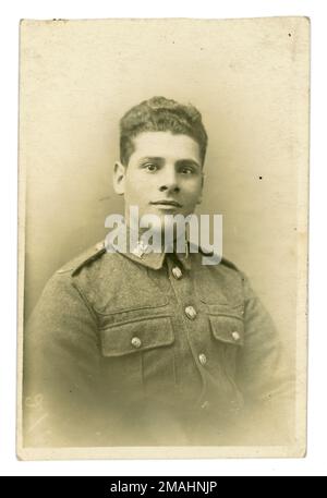 Original WW1 era studio portrait postcard of young man in the Royal Norfolk Regiment. U.K. circa 1916 Stock Photo