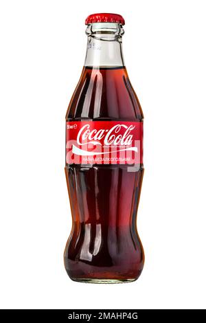 CHISINAU, MOLDOVA - November 14, 2015: Classic bottle Of Coca-Cola isolated on white. With clipping path Stock Photo