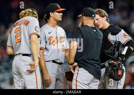 Pitching coach Chris Holt of the Baltimore Orioles talks to his