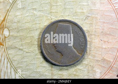 Round old Egyptian coin of two 2 milliemes series 1929 AD 1348 AH features king Fuad I of Egypt on obverse side and value with date on the reverse sid Stock Photo