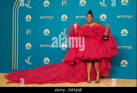 lizzo neon green dress Lizzo Balmain Green Shiny Plus Size Dress Grammys 2021