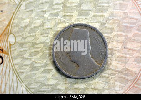 Round old Egyptian coin of two 2 milliemes series 1929 AD 1348 AH features king Fuad I of Egypt on obverse side and value with date on the reverse sid Stock Photo