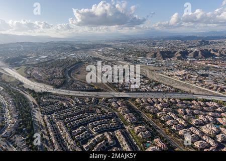 Aerial view of housing developments and the 14 freeway in the Santa Clarita valley near Los Angeles California. Stock Photo
