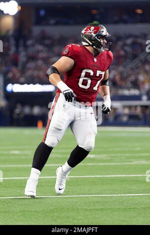 Tampa Bay Buccaneers guard Luke Goedeke (67) prepares to make a block  during the second half of an NFL football game against the Minnesota  Vikings, Sunday, Sept. 10, 2023, in Minneapolis. (AP