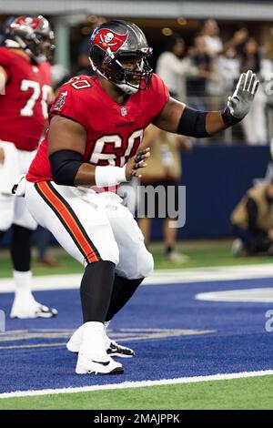 Tampa Bay Buccaneers guard Nick Leverett (60) prays before an NFL football  game against the Atlanta Falcons, Sunday, Dec. 5, 2021, in Atlanta. The Tampa  Bay Buccaneers won 30-17. (AP Photo/Danny Karnik