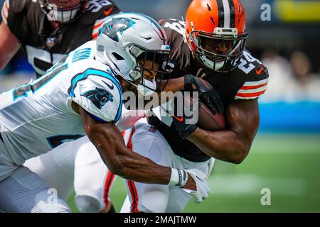 Carolina Panthers' Jeremy Chinn, left, tries unsuccessfully to