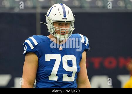 Indianapolis Colts offensive tackle Bernhard Raimann (79) and Houston Texans  defensive end Troy Hairston (34) share a moment after the NFL football game  between the Indianapolis Colts and the Houston Texans on