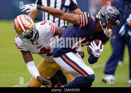 Santa Clara, CA, USA. 26th Sep, 2021. Green Bay Packers' AJ Dillon (28) is  tackled by San Francisco 49ers' Azeez Al-Shaair (51) and San Francisco 49ers'  Emmanuel Moseley (4) after a pass