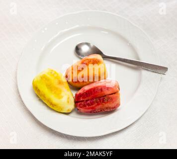 Peeled prickly pears (opuntia) ready to eat Stock Photo