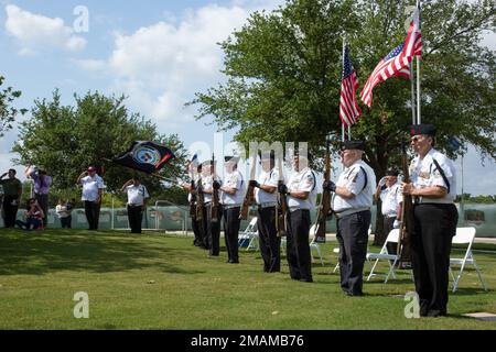 Members of the Fort Sam Houston Memorial Service Detachment present arms during the Memorial Day ceremony at the Fort Sam Houston Cemetery on Joint Base San Antonio - Fort Sam Houston, Texas, May 30, 2022. The Memorial Day ceremony was held to honor all fallen military members who died during their service in the U.S. Armed Forces. Stock Photo