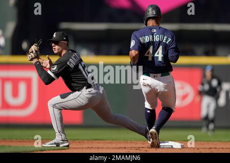 Chicago White Sox shortstop Romy Gonzalez fields a ball hit by Houston  Astros' Alex Bregman and tosses it to second baseman Josh Harrison for the  third out in the top half of