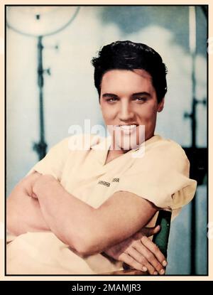 Elvis Presley Hollywood Promotioal Portrait Still of Elvis Presley printed at the time he was leaving to join the army. Elvis Presley relaxed informal stills portrait on the 1958 set of King Creole ©️Paramount Studios  Date 1 June 1958 Stock Photo