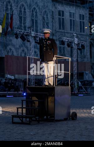 U.S. Marine Corps Chief Warrant Officer 2 Stephen Howell, a band officer with the 2d Marine Division Band, prepares to conduct U.S. Marines with the 2d Marine Division Band during the Belgian Defence International Tattoo in Mons, Belgium, May 31, 2022. This five-day festival is the first Belgian International Tattoo, which was originally planned to commemorate the 75th Anniversary of the Liberation of Belgium in 2020, but was postponed due to COVID-19. Participating military bands include the Belgian, French, Polish and American bands. Stock Photo