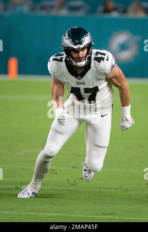 Philadelphia Eagles tight end Grant Calcaterra, right, blocks