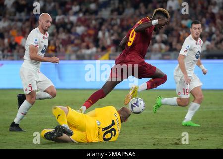 Monza s goalkeeper Michele Di Gregorio on the ground fights for