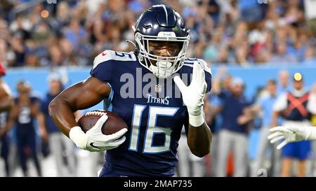 Tennessee Titans wide receiver Treylon Burks (16) works against the Denver  Broncos during the first half of an NFL football game, Sunday, Nov. 13,  2022, in Nashville, Tenn. (AP Photo/Mark Humphrey Stock