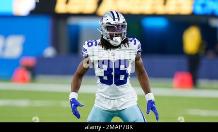 Dallas Cowboys cornerback Isaac Taylor-Stuart runs with the ball