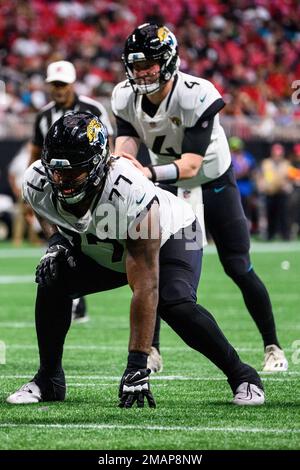 Jacksonville Jaguars center Nick Ford (77) looks at the video screen from  the sidelines during the second half of an NFL preseason football game  against the Cleveland Browns, Friday, Aug. 12, 2022