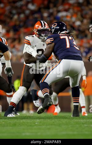 Chicago Bears offensive tackle Riley Reiff (78) and offensive tackle Lachavious  Simmons (73) attempt to block Cleveland Browns defensive tackle Perrion  Winfrey (97) during an NFL preseason football game, Saturday Aug. 27