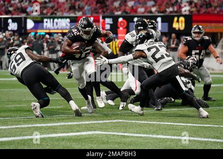 Atlanta Falcons running back Caleb Huntley (42) runs the ball during the  second half of a preseason NFL football game against the Tennessee Titans,  Friday, Aug. 13, 2021, in Atlanta. The Tennessee