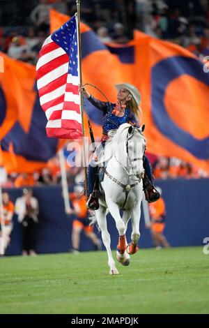 Rider Ann Judge guides Thunder during a ceremonial run after the Denver  Broncos scored in the first half of an NFL preseason football game  Saturday, Aug. 26, 2023, in Denver. (AP Photo/David