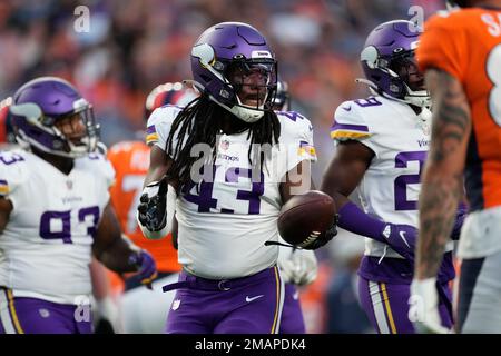 Las Vegas Raiders linebacker Luke Masterson (59) and Minnesota Vikings  linebacker Luiji Vilain (43) during the