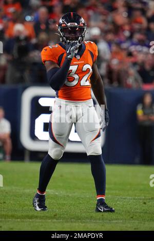 Denver Broncos safety Delarrin Turner-Yell walks on the sideline