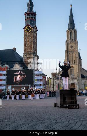 U.S. Marine Corps Chief Warrant Officer 2 Stephen Howell, a band officer with the 2d Marine Division Band, conducts during the Belgian Defence International Tattoo in Sint-Truiden, Belgium, June 2, 2022. This five-day festival is the first Belgian International Tattoo, which was originally planned to commemorate the 75th Anniversary of the Liberation of Belgium in 2020, but was postponed due to COVID-19. Participating military bands include the Belgian, French, Polish and American bands. Stock Photo