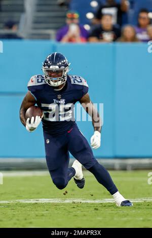 Tennessee Titans running back Hassan Haskins (25) runs during an