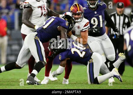 Baltimore Ravens safety Geno Stone (26) drops back in coverage as he  defends during an NFL preseason football game against the Tampa Bay  Buccaneers, Saturday, Aug. 26, 2023, in Tampa, Fla. (AP