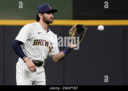 Milwaukee Brewers' Garrett Mitchell warms up on deck before a spring  training baseball game against the Kansas City Royals Monday, Feb. 27, 2023,  in Surprise, Ariz. (AP Photo/Charlie Riedel Stock Photo - Alamy