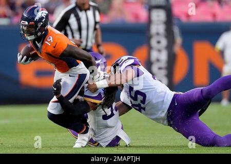 Denver Broncos wide receiver Seth Williams (19) is tackled by