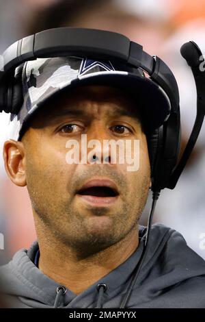 Defensive line coach Aden Durde of the Dallas Cowboys wears a USA/United  Kingdom pin during an NFL football game against the Washington Commanders  in Arlington, Texas, Sunday, Oct. 2, 2022. (AP Photo/Ron