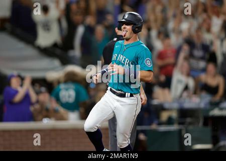 Mitch Haniger of the Seattle Mariners reacts after hitting a two-run single  in the eighth inning of a game against the Los Angeles Angels on Oct. 2,  2021, at T-Mobile Park in