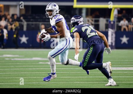 Dallas Cowboys wide receiver Brandon Smith (80) catches a pass in front of Seattle  Seahawks cornerback John Reid (29) in the second half of a preseason NFL  football game in Arlington, Texas, Friday, Aug. 26, 2022. (AP Photo/Michael  Ainsworth Stock