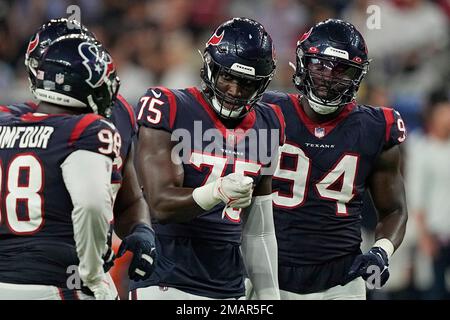 Houston Texans defensive end Adedayo Odeleye (75) walks toward the huddle  during the second half of an NFL preseason football game against the New  Orleans Saints Saturday, Aug. 13, 2022, in Houston. (