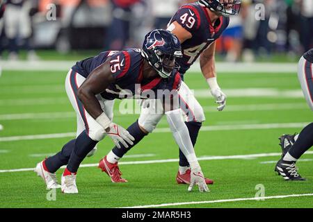 Houston Texans defensive end Adedayo Odeleye (75) walks toward the huddle  during the second half of an NFL preseason football game against the New  Orleans Saints Saturday, Aug. 13, 2022, in Houston. (