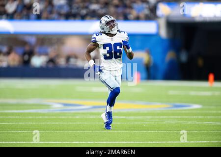 Dallas Cowboys cornerback Isaac Taylor-Stuart runs with the ball