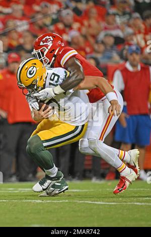 Green Bay Packers quarterback Danny Etling (19) throws a pass during an NFL  pre-season football game against the Kansas City Chiefs Thursday, Aug. 25,  2022, in Kansas City, Mo. (AP Photo/Peter Aiken