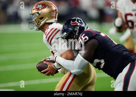 Houston Texans defensive end Adedayo Odeleye (75) walks toward the huddle  during the second half of an NFL preseason football game against the New  Orleans Saints Saturday, Aug. 13, 2022, in Houston. (