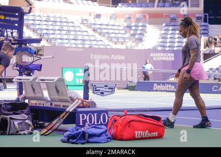 Serena Williams throws her racket after losing the second set tiebreak to  Victoria Azarenka of Belarus in the Woman's Final in Arthur Ashe Stadium at  the U.S. Open Tennis Championships at the