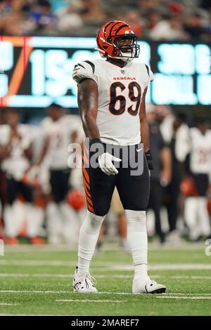 Cincinnati Bengals defensive end Raymond Johnson III (56) runs for the play  during a preseason NFL