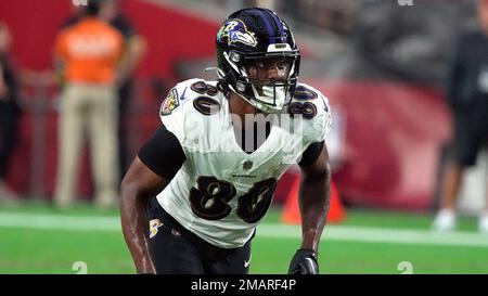 Baltimore Ravens tight end Isaiah Likely (80) warms up prior to an