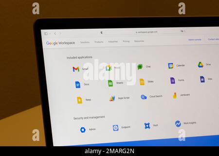 Webpage of Google Workspace, showing icons of included applications, are seen on the Google website on a MacBook computer. Stock Photo